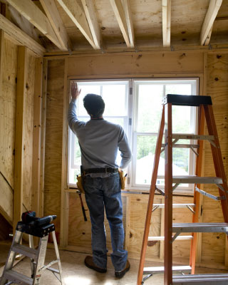 contractor installing windows